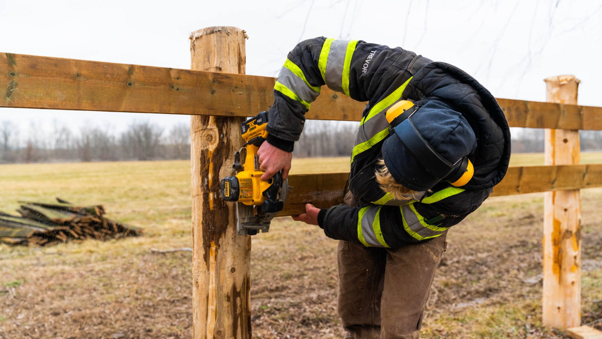 Steel City Fence Co — a custom wooden fence under construction